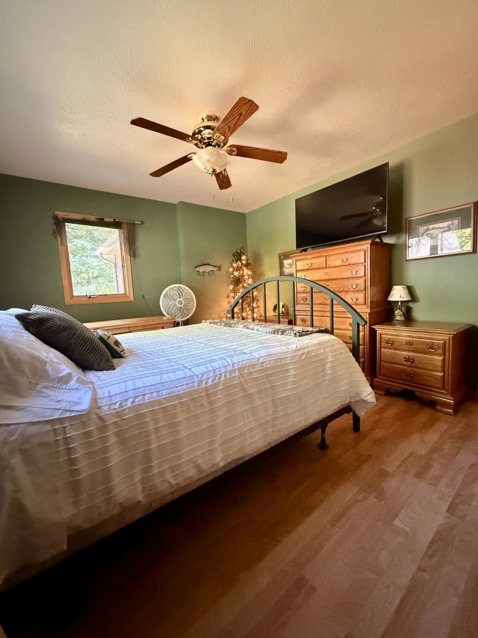 Primary bedroom at The Loon Hollow