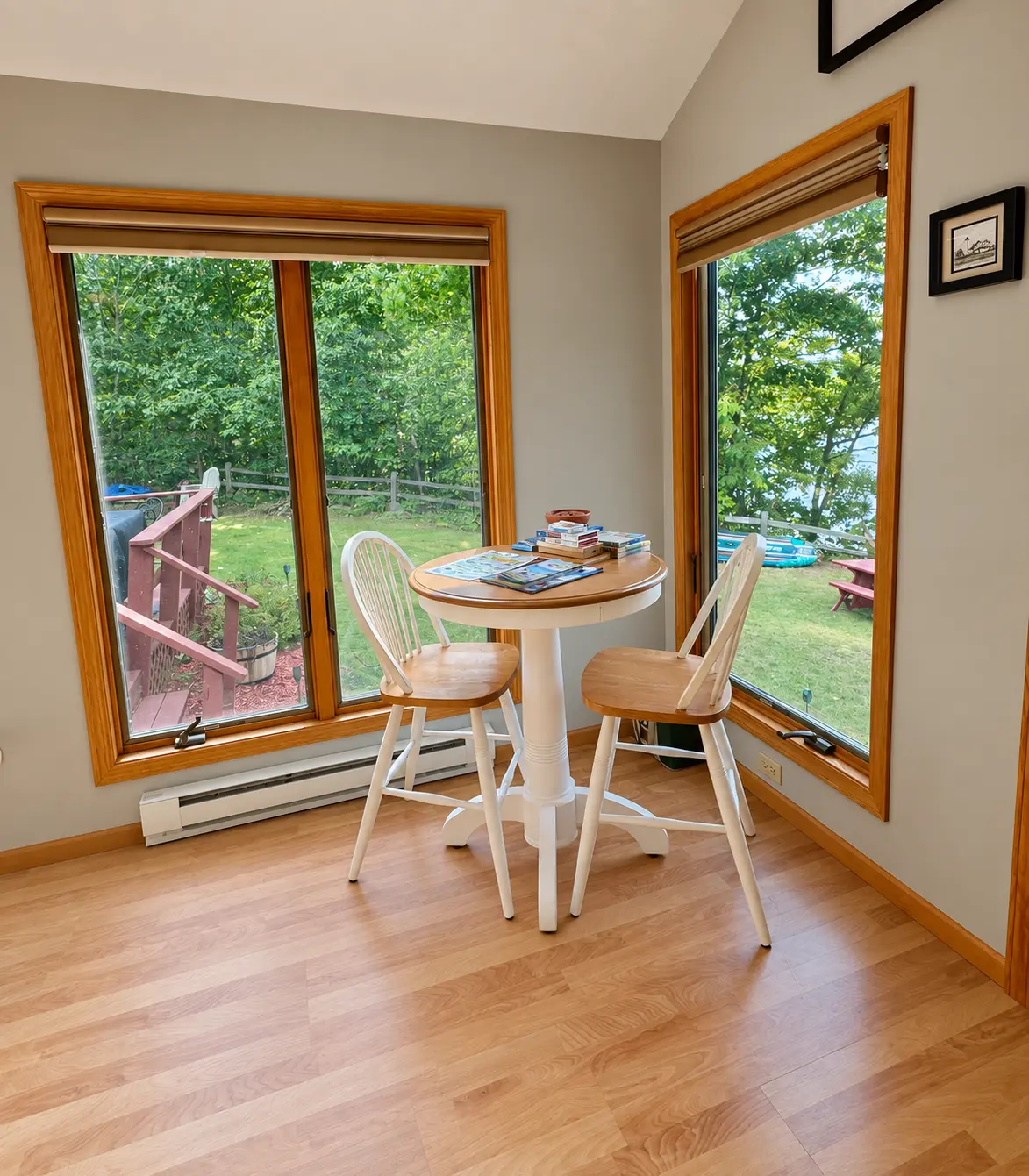 Breakfast nook with windows overlooking the property