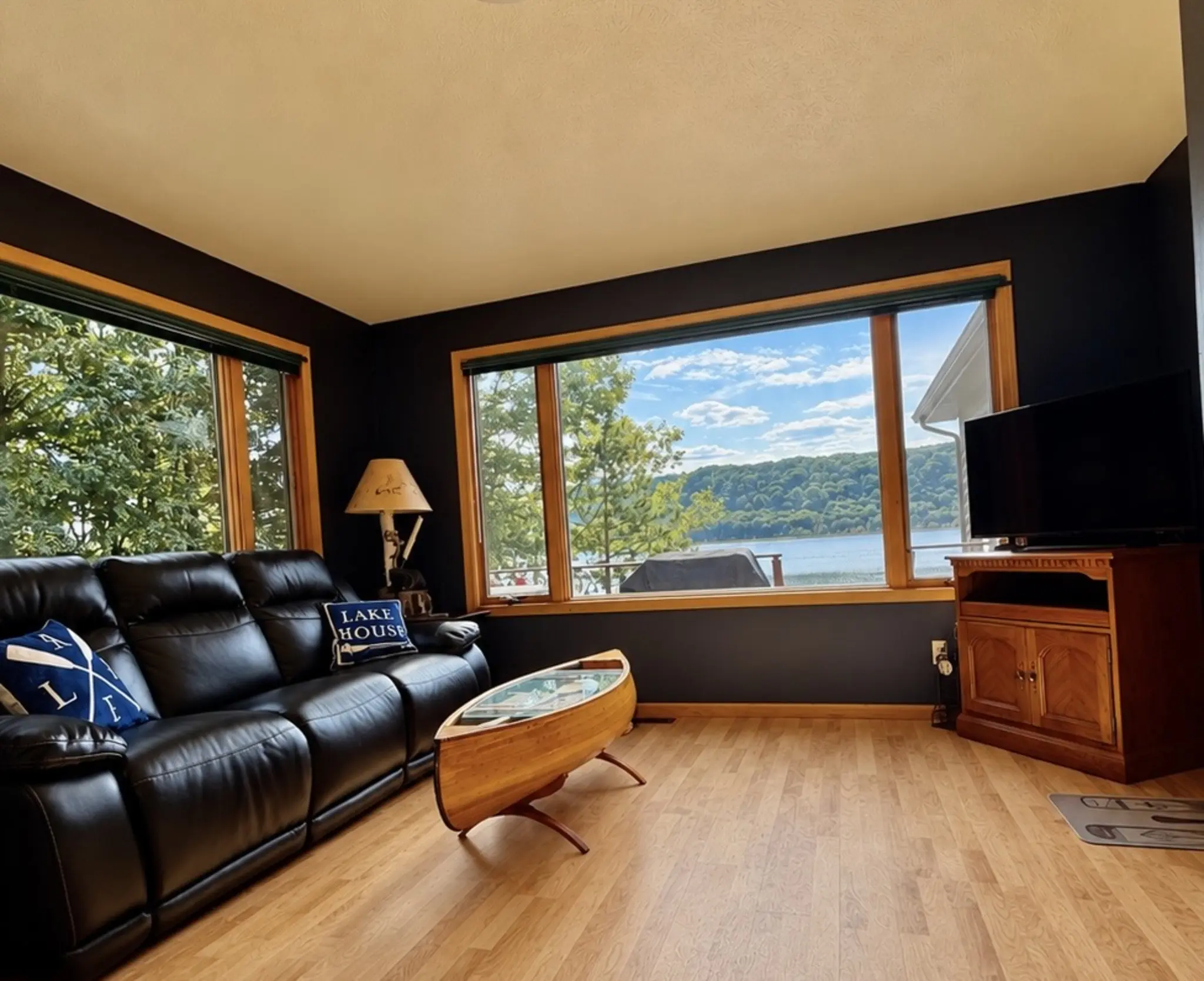 Lower canoe view looking through the lake-facing living-room windows
