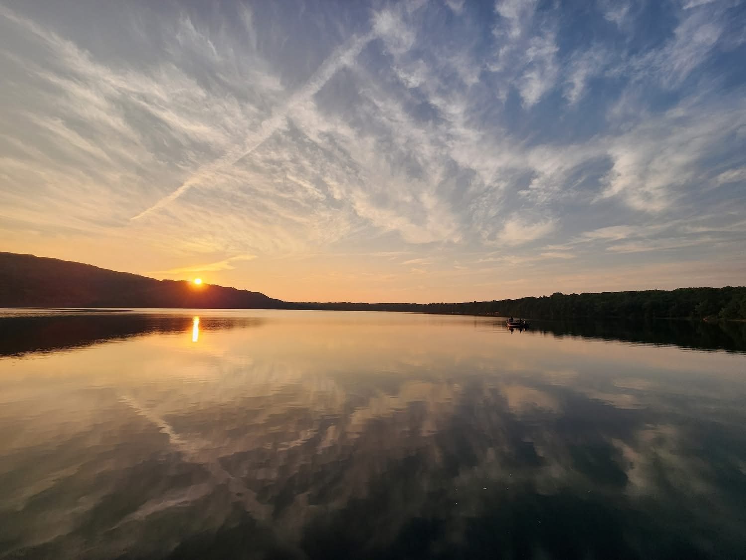 Golden sunset reflected across Monocle Lake
