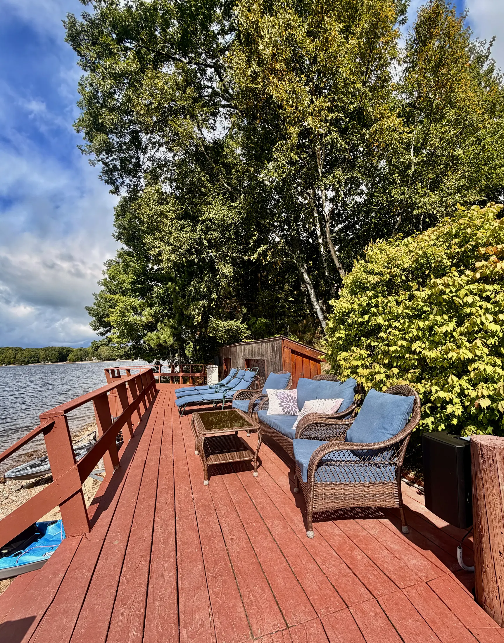 Waterfront deck seating along Monocle Lake